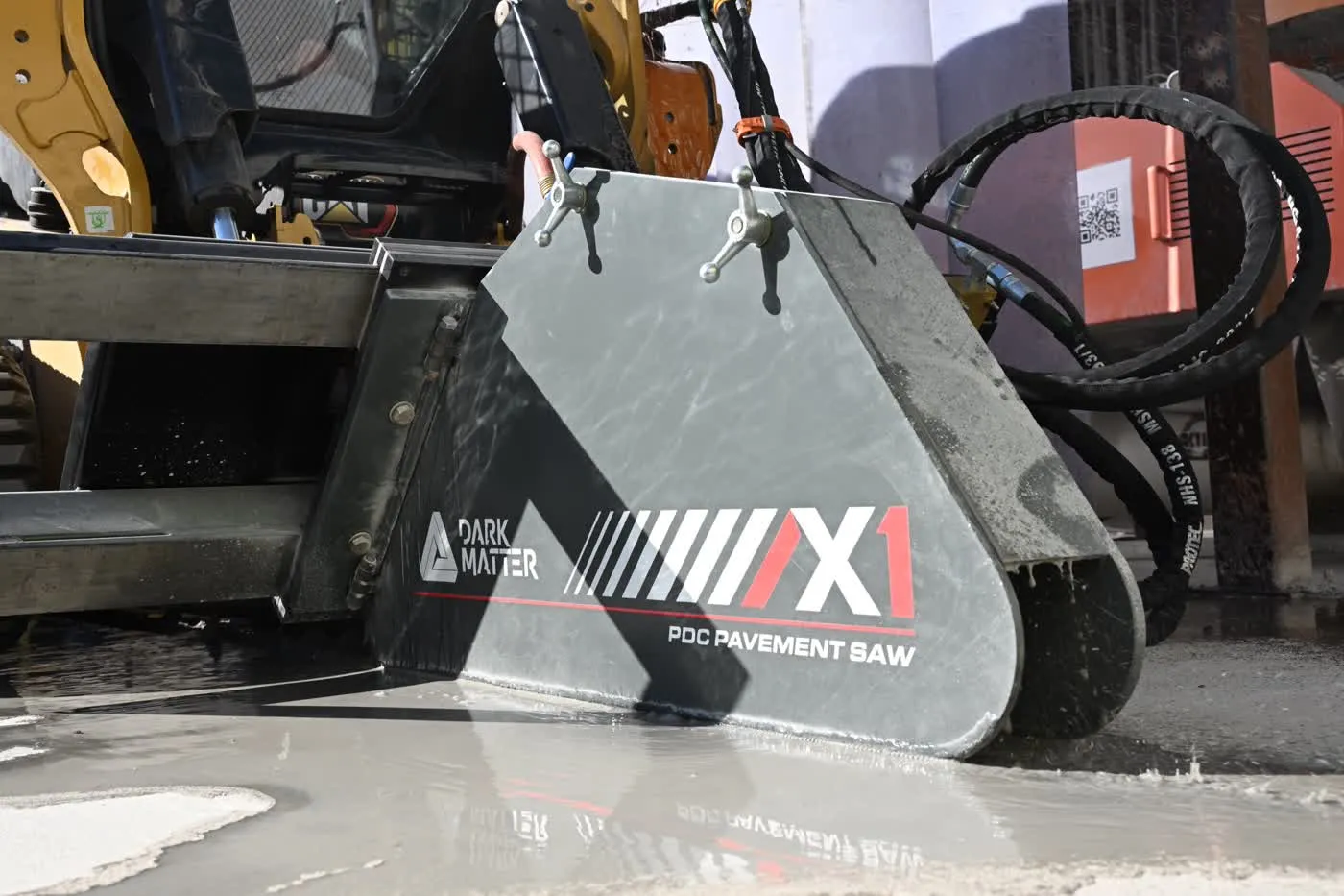 X1 PDC Pavement Saw on a track loader